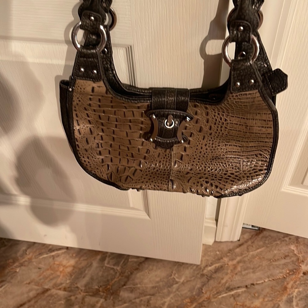 Green leather handbag.
